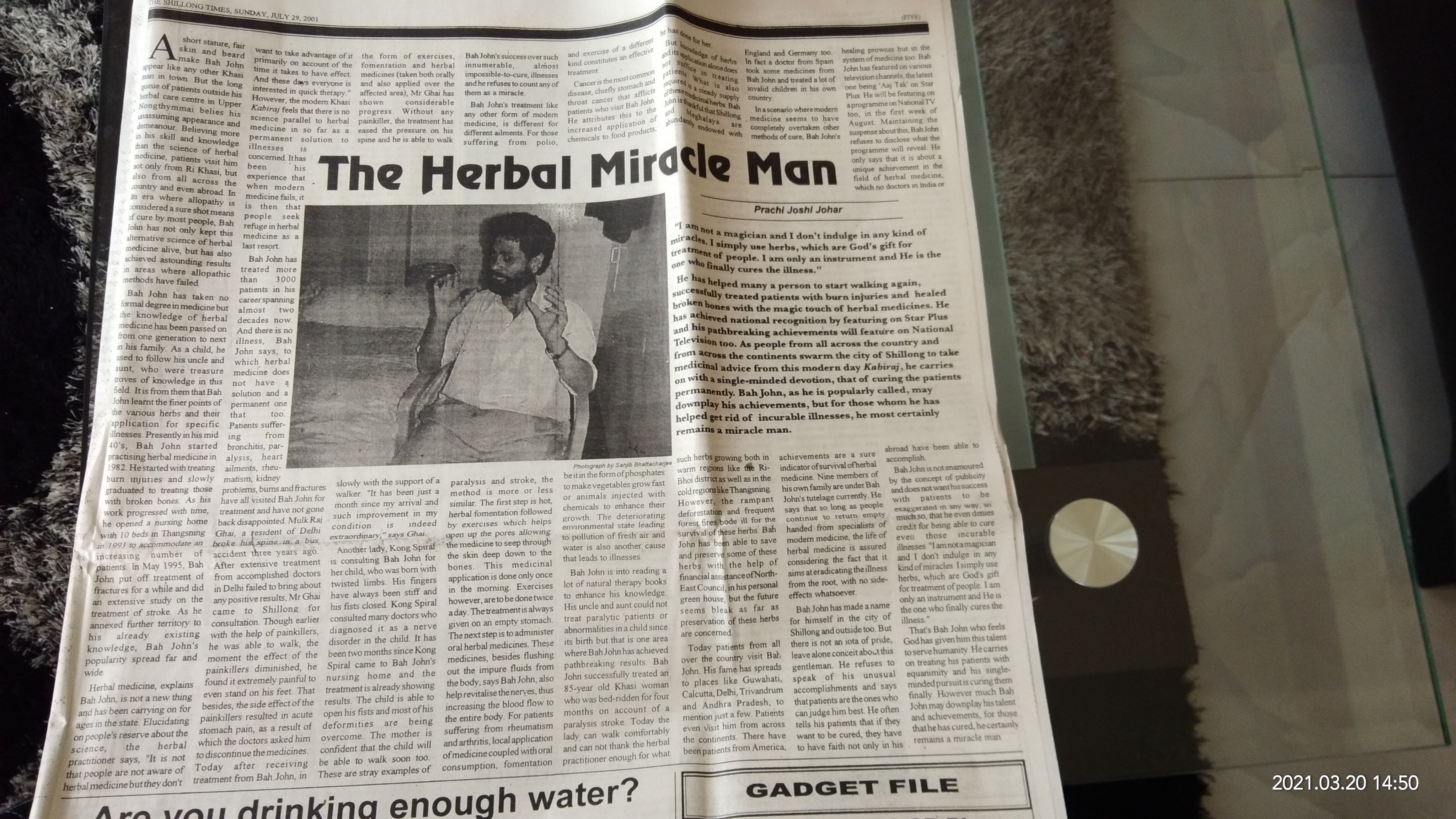 Newspaper spread with title “The Herbal Miracle Man”