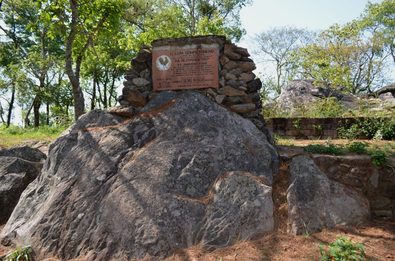 A sign entering Lum Sohpetbneng, a revered mountain site for the Khasi