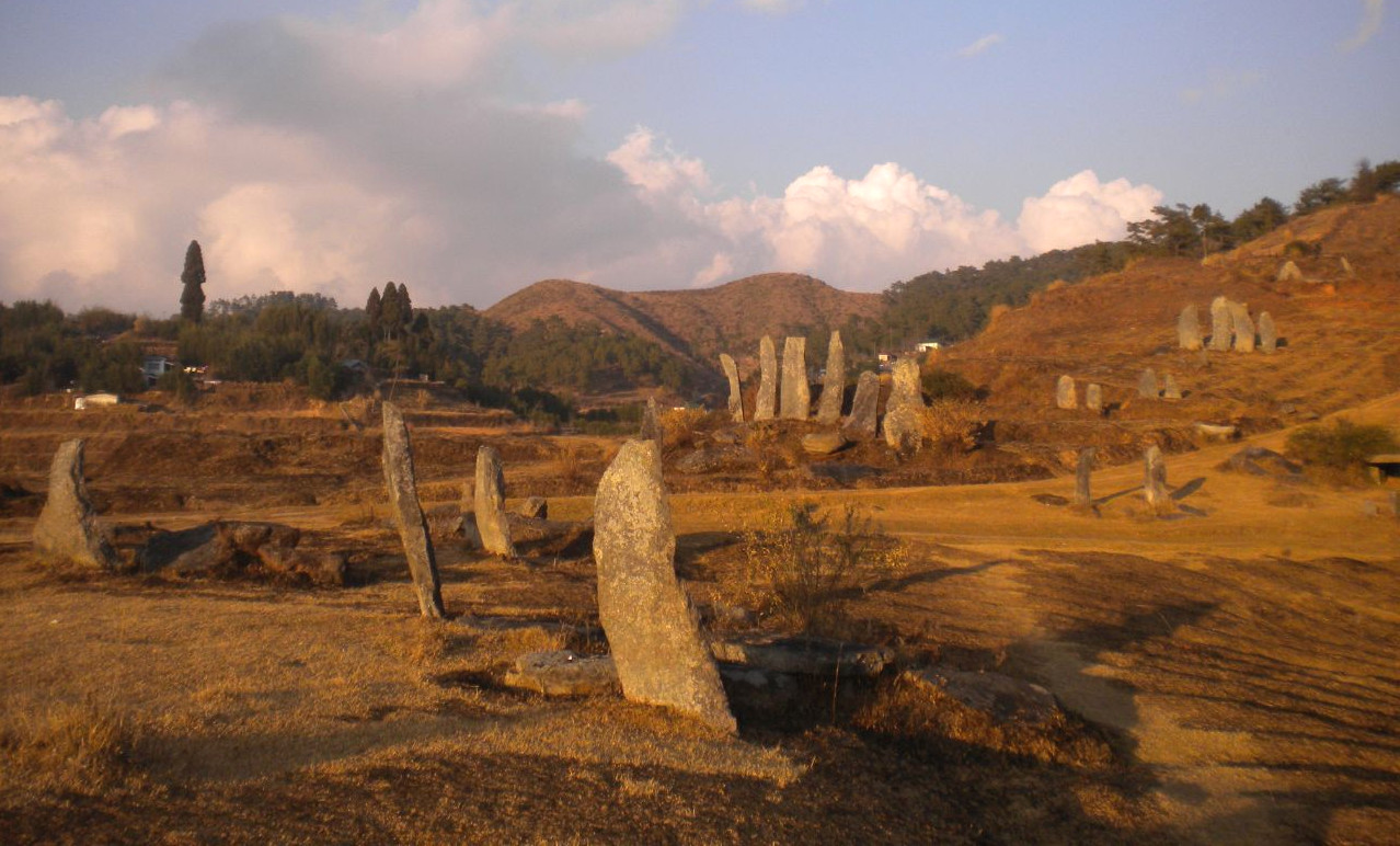 Monoliths in a field and hillside