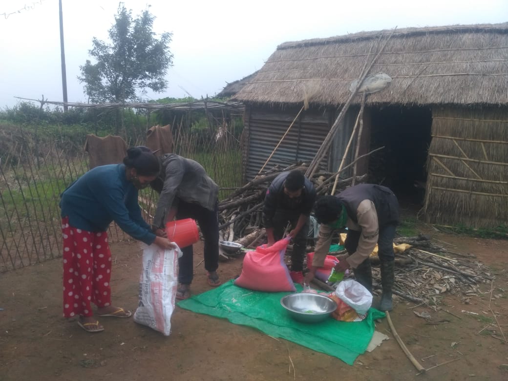 A group of people splitting a harvest